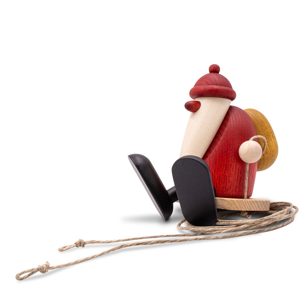 KOE - 660 - Bjoern Koehler - Weihnachtsmann auf Schaukel, klein, rot/natur 9cm