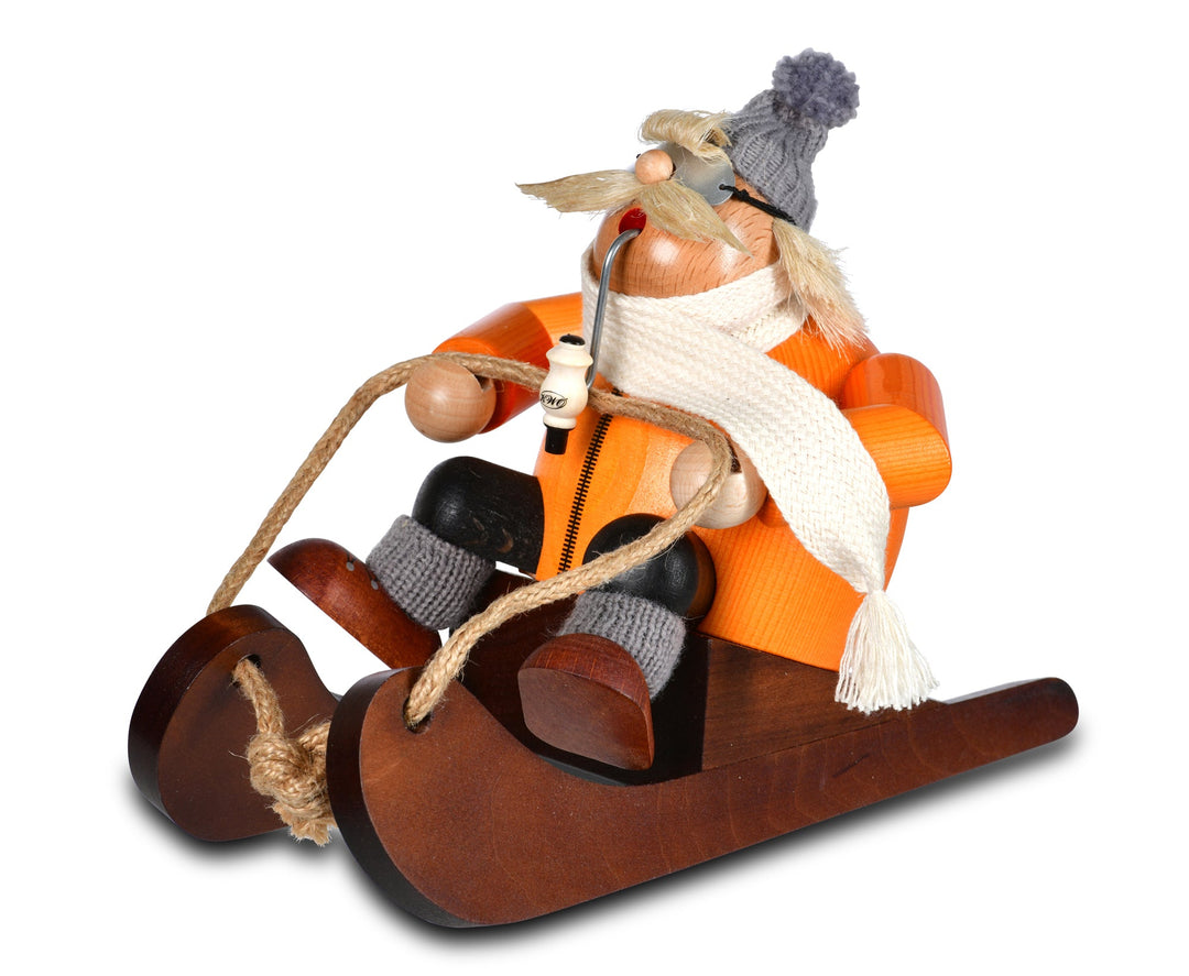 KWO - A21415 - KWO - Räuchermann Rodler Andi in orange auf dem Schlitten, Holzkunst, 13x22x16cm - 2025