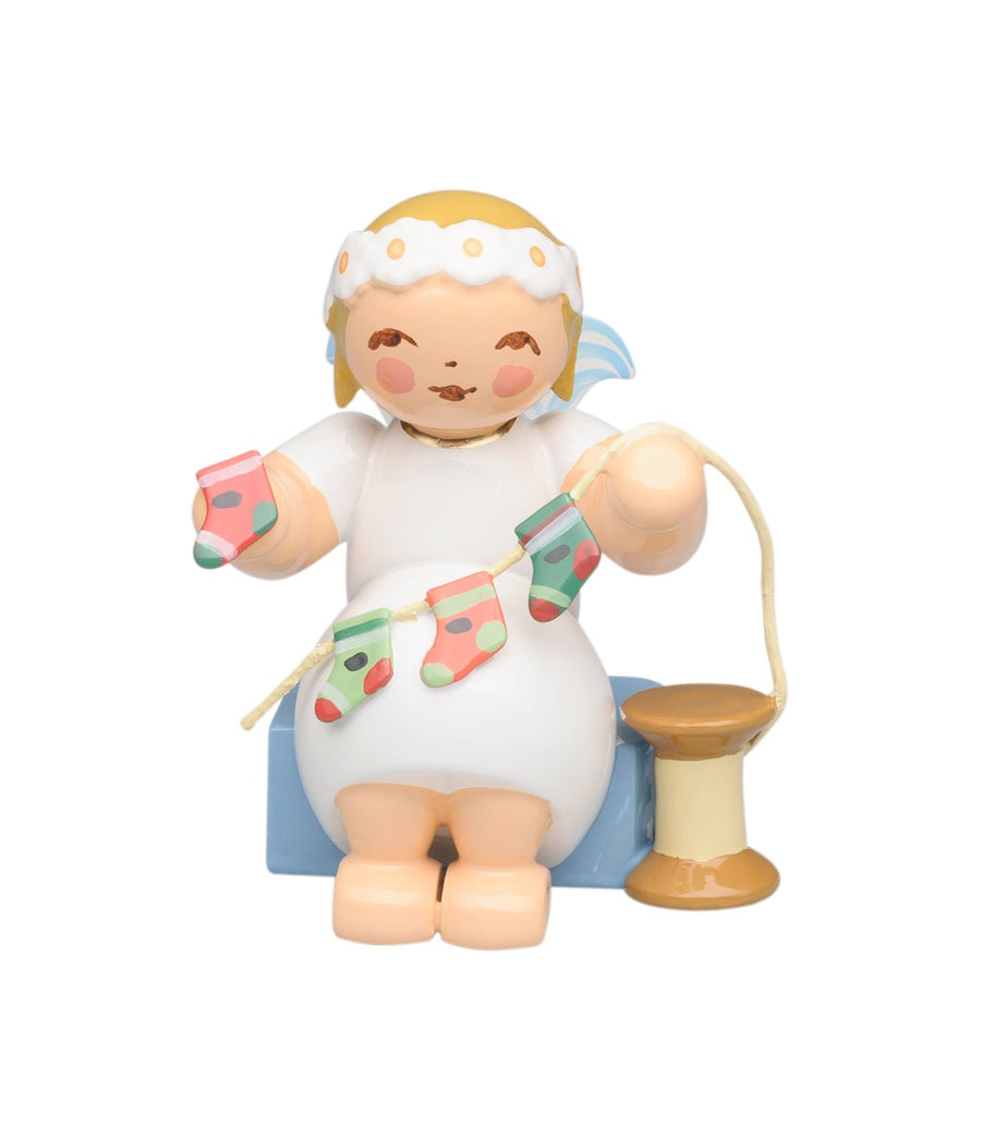 WUK - 634/70/44 - Wendt & Kühn 'Margeritenengel, sitzend, mit Adventskalender - 4cm' 2024