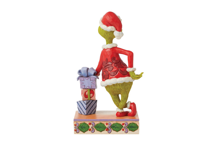 6015218 - Grinch lehnt sich auf gestapelte Geschenke - 20,5cm, Jim Shore 2024