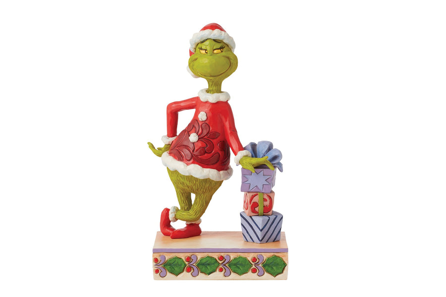 6015218 - Grinch lehnt sich auf gestapelte Geschenke - 20,5cm, Jim Shore 2024