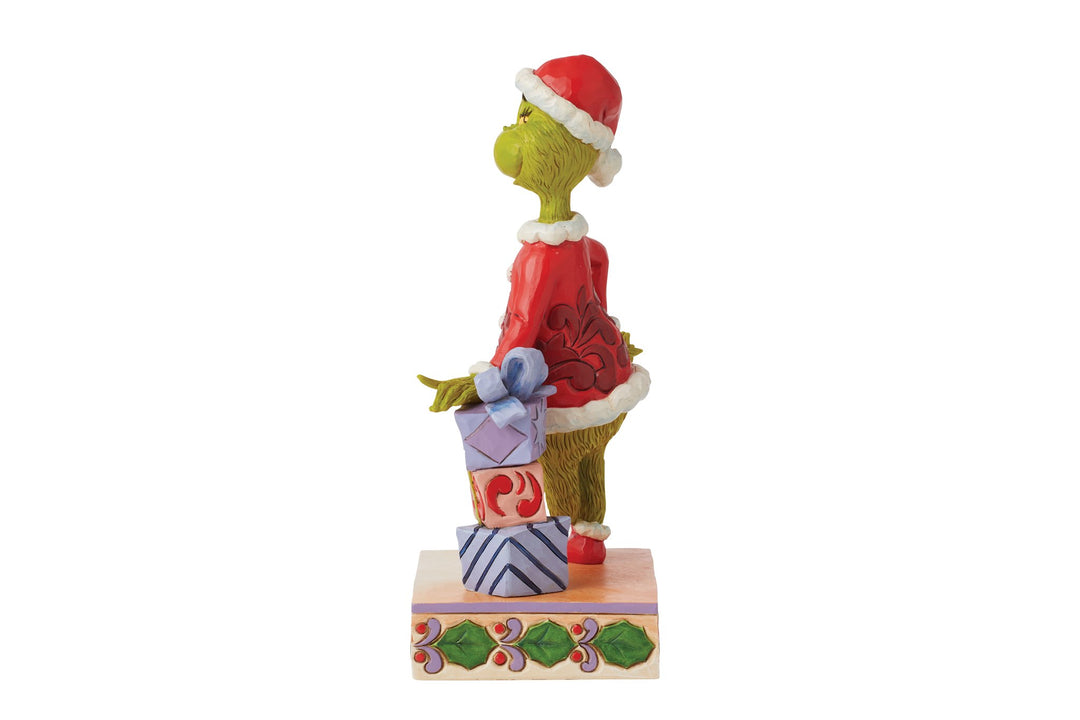 6015218 - Grinch lehnt sich auf gestapelte Geschenke - 20,5cm, Jim Shore 2024