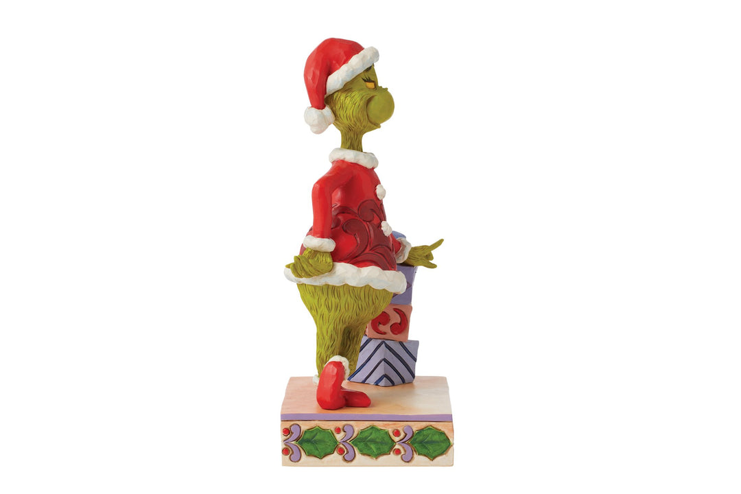 6015218 - Grinch lehnt sich auf gestapelte Geschenke - 20,5cm, Jim Shore 2024