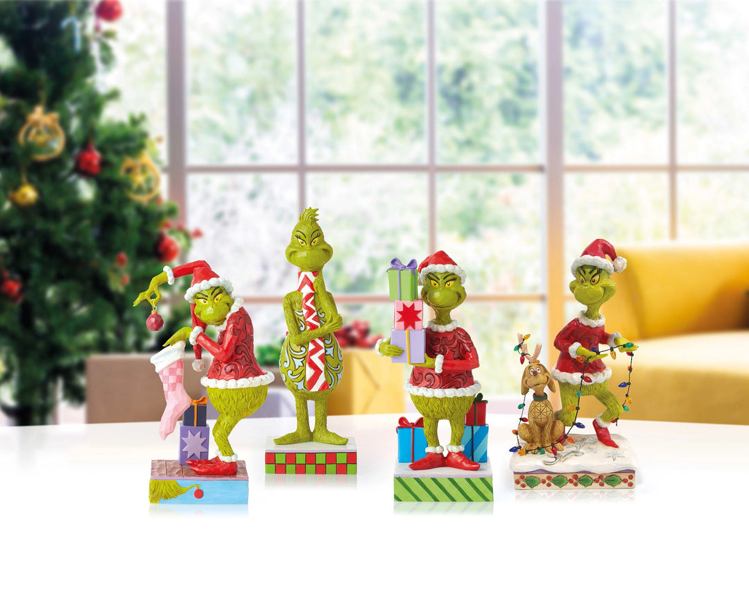 6010778 - Jim Shore - Grinch 'Grinch Holding Presents N' 2022