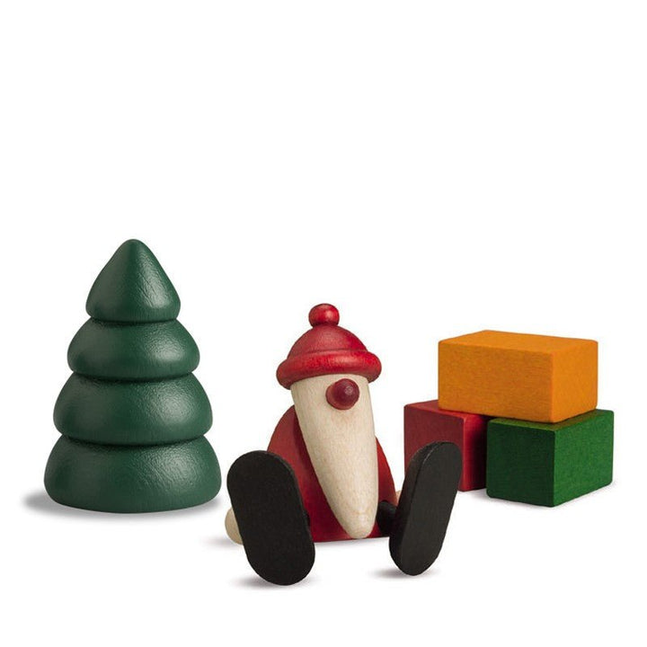 Bjoern Koehler - Miniaturset 1 - Weihnachtsmann auf Kante sitzend mit Baum und Geschenken KOE - 11680