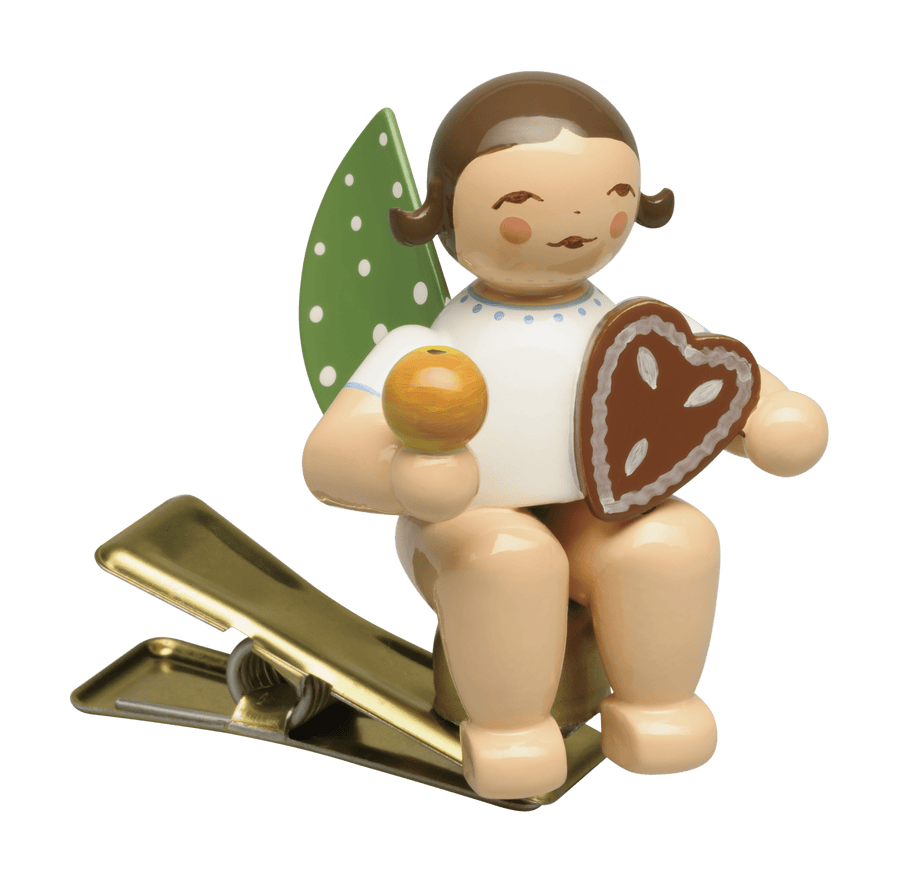 WUK - 650/90/150 - braunesHaar - Wendt & Kühn 'Engel mit Lebkuchen und Apfel, auf Klemme - 5,5cm braun' 2025
